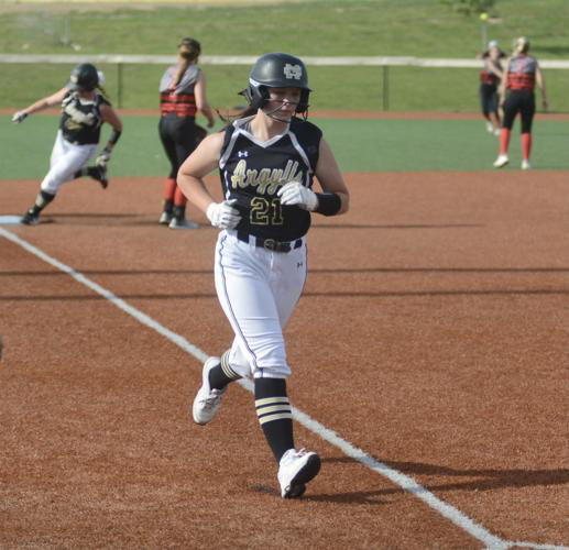 Carley Holliday running to home base