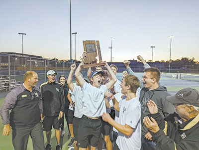 Madison-Grant’s boys tennis team celebrates the first sectional title in program history after sweeping Marion 5 to 0.