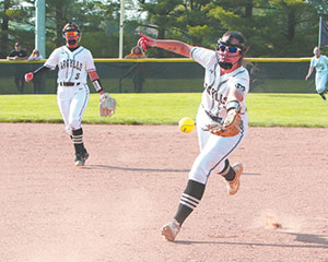 Madison-Grant’s Makennah Clouse flips the ball to first base for the out.